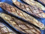 Roasted aubergine with fried onion & chopped lemon