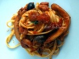 Linguine con seppie gamberi e olive