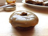 Baked chocolate doughnuts with salted caramel glaze