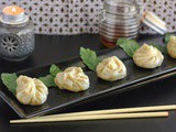 Steamed dumplings with chili dipping sauce