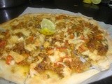 Thin crust minced meat pizza