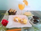 Eggs Benedict, granola bars e Mimosa