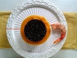 Pilaf di riso venere con gamberi,lardo e crema di zucca speziata