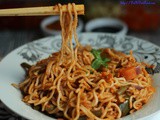 Veggie noodles in tomato walnut sauce -Indo-chinese