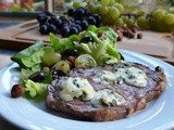 Blue cheese topped beef with grapes