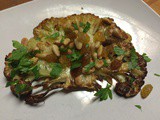 Roasted Cauliflower Steaks with Golden Raisins & Pine Nuts