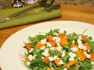 Roasted pumpkin and rocket salad with feta cheese and pine nuts