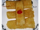 Patishapta (Maida and Moong Crepes with Kheer Filling)