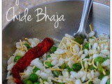 Motorshuti diye Chire Bhaja ( Crispy beaten rice with green peas)