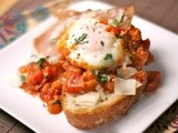 Eggs poached in chunky tomato sauce