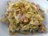 Riso di semola con carciofi e salsiccia