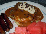 Chunky Monkey Pancakes (Banana, chocolate chip pancakes w/ peanut butter maple syrup)