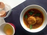 Egg Paniyaram in a Tamarid gravy