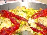 Paella met rivierkreeft en kip recept