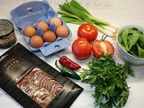 Chorizo and bean stew with a baked egg “hat”