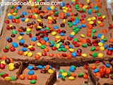 Chocolate frosted brownies with m & m's
