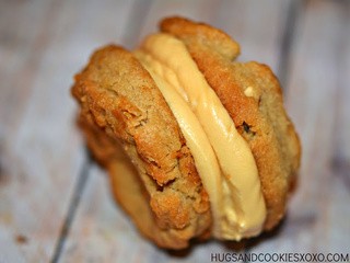 Peanut butter cookies stuffed with caramel butter cream frosting