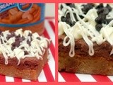 White chocolate blondies topped with peanut butter chocolate cookie dough frosting