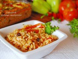 Γεμιστα πιλαφι φουρνου (αποδομημενα) ♦♦ riso al forno, versione estiva con peperoni e pomodori