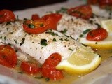 Red Snapper in a Lemon, Creme Fraiche, Oregano Sauce with Roasted Tomatoes