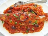 Whole roasted sea bass in a sweet tomato and onion sauce
