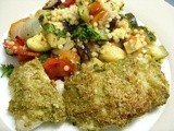 Pesto crusted cod with roast vegetable giant couscous