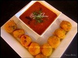 Batata Vada Rassa / Aloo Bonda with Black Chickpeas Curry