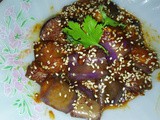 Spiced aubergine with chilli sauce and sesame seeds