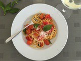 Spaghetti with cherry tomatoes and basil