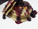 Blueberry Banana Pancakes with a blueberry syrup