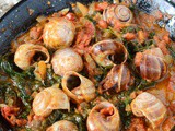 Snails with tomato and spinach
