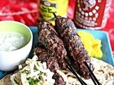 Grilled Beef Kebabs with Yogurt-Mint Sauce and Onion Salad recipe