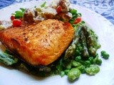 A splendid fish supper: grilled salmon with a warm salad of spring vegetables