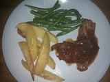 Spicy Lamb Cutlets with Seasoned Wedges and Garlic Beans