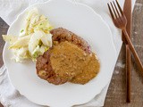 Steak with pink peppercorn sauce