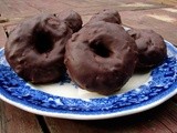 Baked chocolate-coated cake donuts