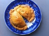 Empanadas with roasted golden beets, pistachios, raisins and greens