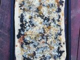 Pizza with chard, golden raisins and pine nuts