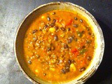 Red rice, red lentil, and black bean chili