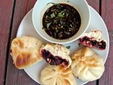 Steamed dumplings with beets, black beans and lime