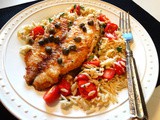 Tilapia Piccata-Style over Parsley and Tomato Orzo