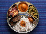Mangalorean Plated Meal Series - Boshi# 29 - Ambadyanchi Kadi, Mitgi Sango Miryapito, Fried Fish, Fried Pathrode, Pickle & Rice