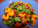 Roasted butternut squash with baby spinach and pomegranate