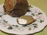 Steamed artichokes with creamy lemon and chive sauce