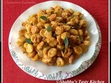Chemmeen Kadumbu (Steamed Rice Dumplings in Prawns Gravy)