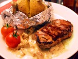 Tenderloin Steak with Mushroom Sauce and Jacket Potatoes