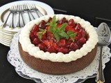 Vanilla Bean Cheesecake w/ Citrus-Ginger Honey Glazed Strawberries