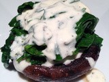 Stuffed portobello mushroom with an herbed goat cheese sauce