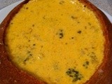 Broccoli, Cauliflower, and Cheddar Soup Served in Crusty Bread Bowls