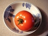 First tomato of the season picked this morning!  And, updated photos of transpalnted Dogwood tree